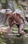 钢铁大汉地里站，腰缠钢绳力无边，一个吊锤把土扎，层层泥浆往外翻。 （打一物）