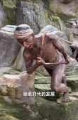 钢铁大汉地里站，腰缠钢绳力无边，一个吊锤把土扎，层层泥浆往外翻。 （打一物）